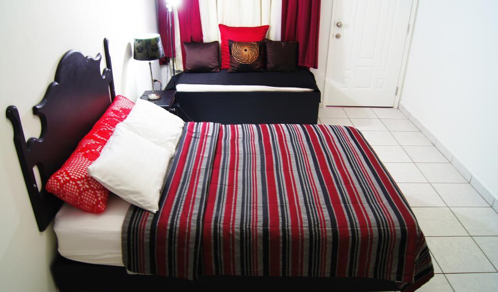 Uw Oasis Hotel La Ceiba Chambre photo